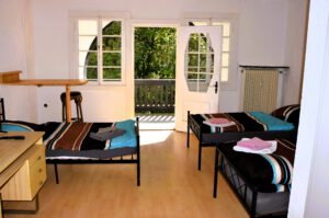 Dreibettzimmer mit Bad und Balkon